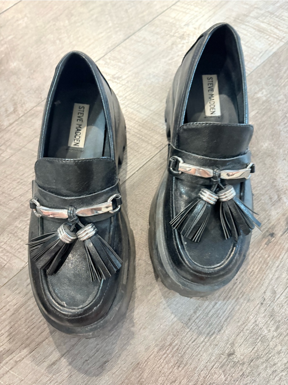 Steve Madden Black Leather Tassel Loafers with Silver Accent